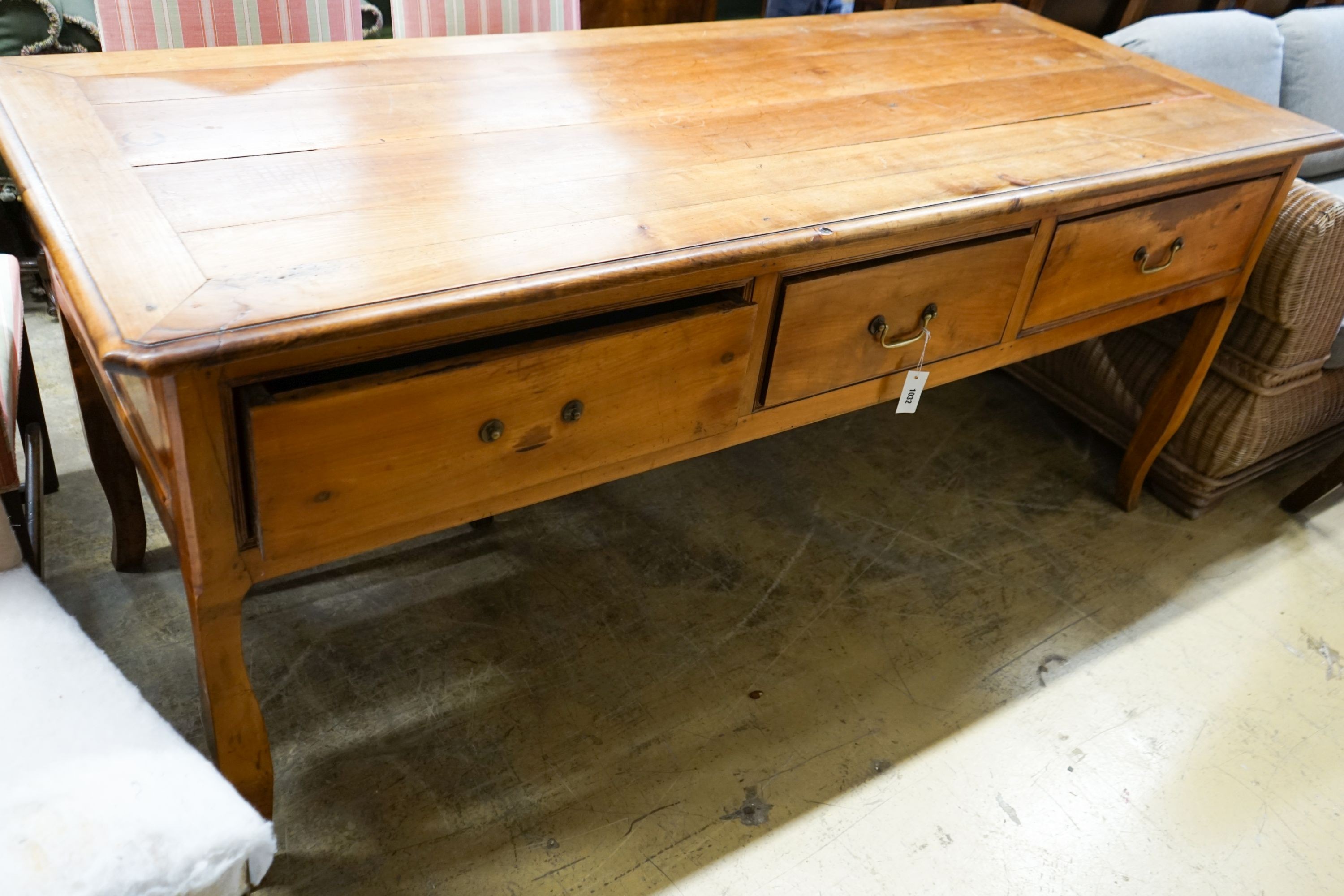 A 19th century French cherrywood six drawer serving table, length 200cm, depth 79cm, height 84cm